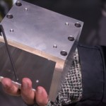 Brackets that hold the CS100 controller to the Nasmyth Cage.