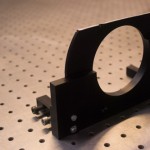 Metal piece used to hold the Fabry-Perot inside SAM. Front view.
